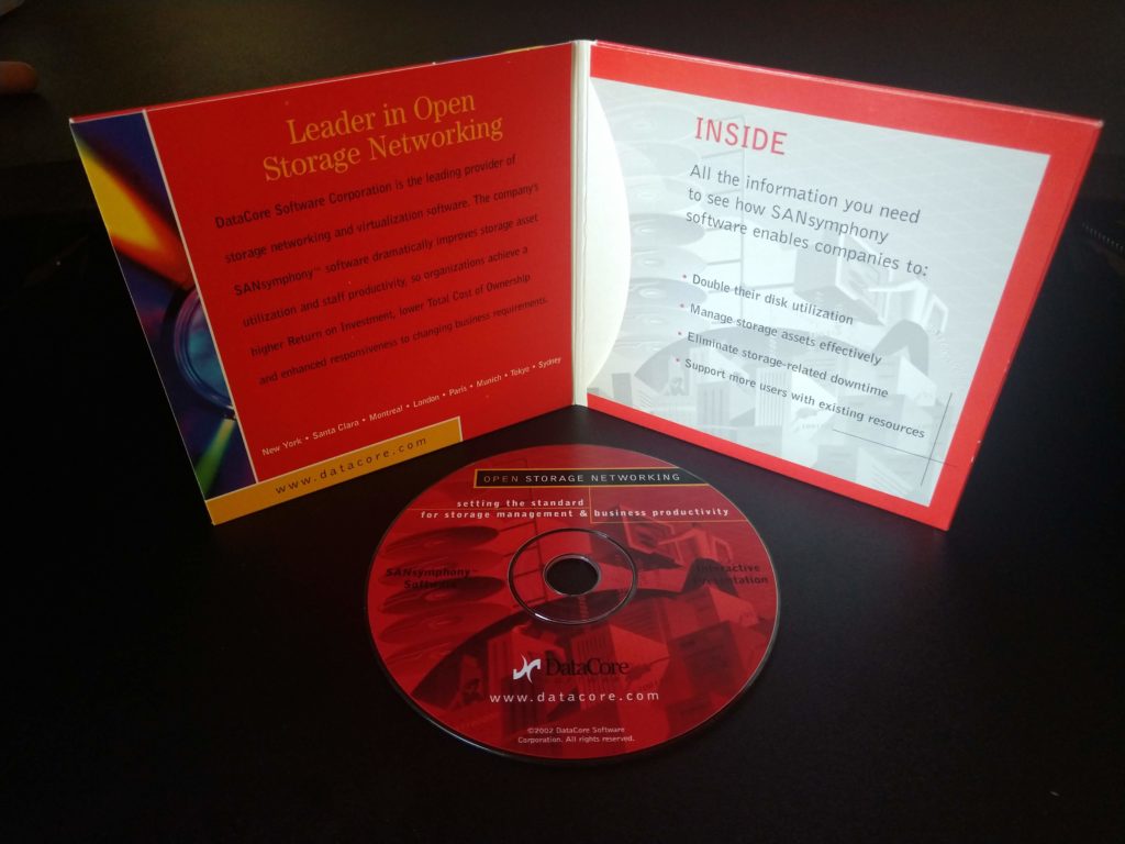 A red CD with a DataCore logo sits in front of its sleeve.